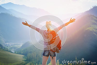 Woman hiking outdoors. Eco Tourism. Stock Photo