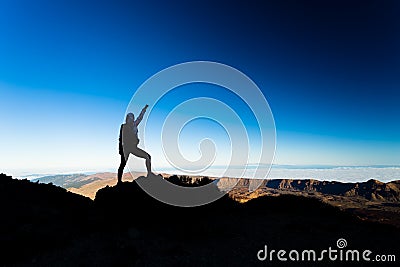 Woman hiking success silhouette on mountain top Stock Photo