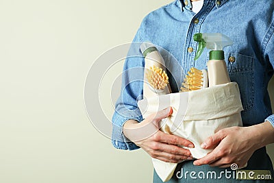 Woman hold bag with eco friendly cleaning products Stock Photo