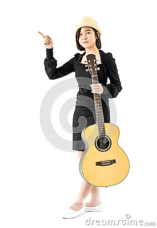 Woman hold guitar guitar folk song in her hand Stock Photo