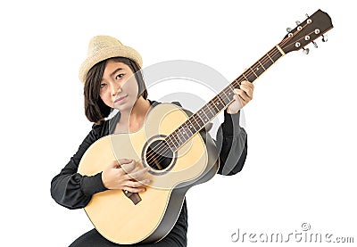 Woman hold guitar guitar folk song in her hand Stock Photo