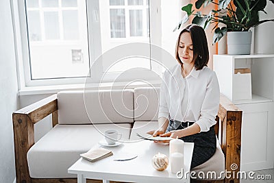 Woman hold metaphorical associative cards. Stock Photo