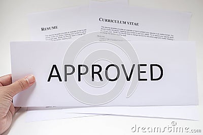 Woman hold the resume approve Stock Photo