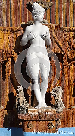Woman holdig his breasts sculpture Stock Photo