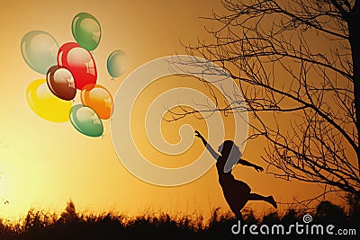 Woman holding balloons Stock Photo