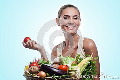 Woman holding basket with vegetable. Concept vegetarian dieting Stock Photo