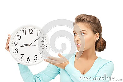 Woman holding big clock Stock Photo