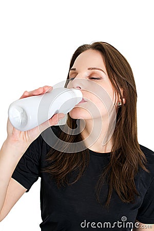 Woman Holding A Bottle Of Lactose Free Milk Stock Photo