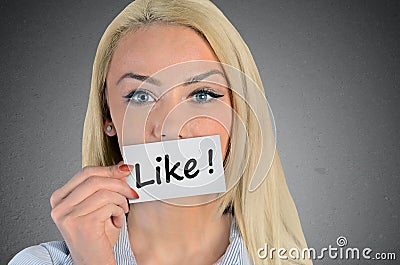 Woman holding card with Like word Stock Photo