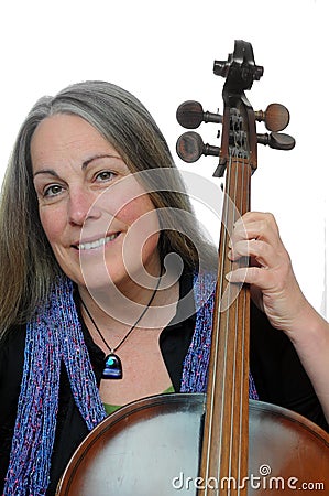 Woman holding cello smiling Stock Photo