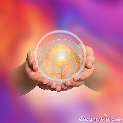 Woman holding concentrated healing energy in hands, closeup Stock Photo