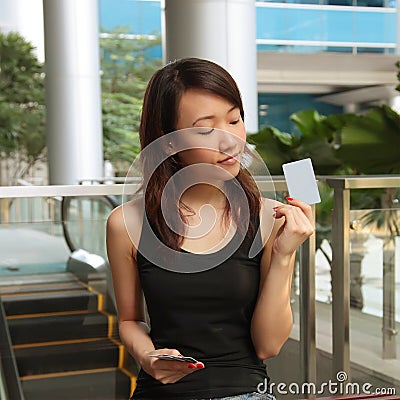 Woman Holding a Credit Card Stock Photo