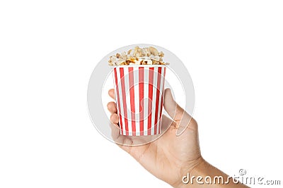 Woman holding cup with delicious popcorn on white background Stock Photo