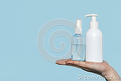 woman holding disinfectant bottles. High quality photo Stock Photo