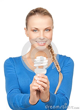 Woman holding energy saving bulb Stock Photo