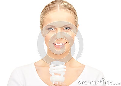 Woman holding energy saving bulb Stock Photo