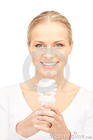 Woman holding energy saving bulb Stock Photo