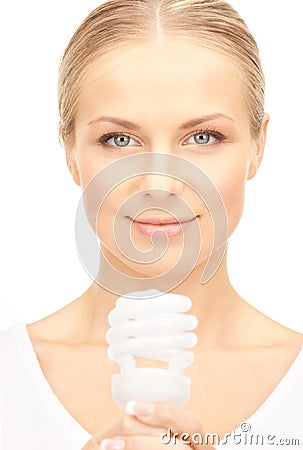 Woman holding energy saving bulb Stock Photo