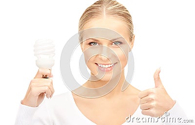 Woman holding energy saving bulb Stock Photo