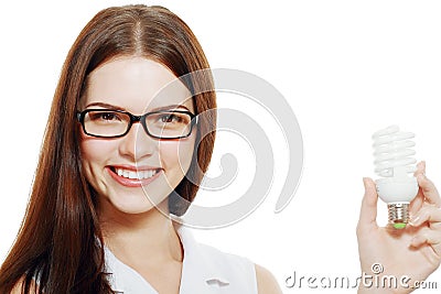 Woman holding energy saving lamp Stock Photo