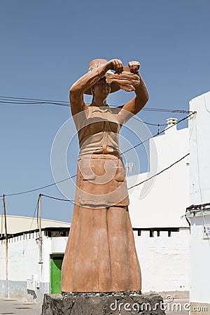 Woman Holding Fish, Fuerteventura, Spain, editorial Editorial Stock Photo