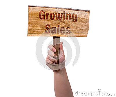 Growing sales wooden sign Stock Photo