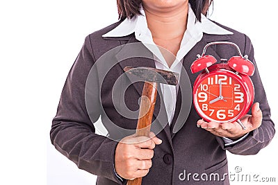 Woman holding hammer and red alarm clock isolated on white. Breaking time concept Stock Photo