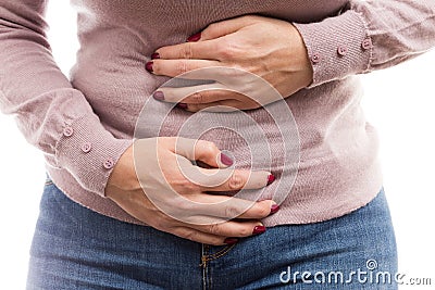 Woman holding her tummy as painful abdomen problem Stock Photo