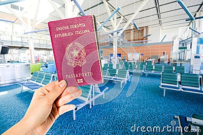 Woman holding an Italian passport European Union Stock Photo