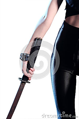 Woman holding katana sword in hand Stock Photo