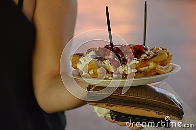 Woman holding a Large portion of French Toast Stock Photo