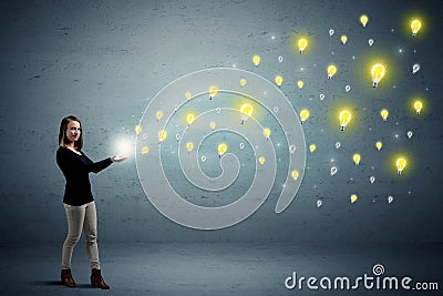 Woman holding lightbulbs Stock Photo