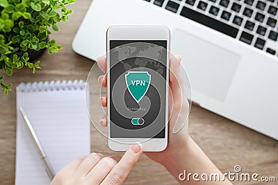 woman holding phone app vpn creation Internet protocols protection network Stock Photo