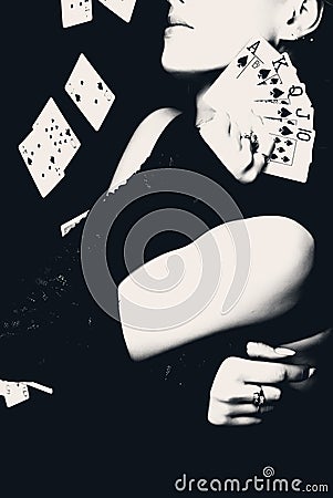 Woman holding playing cards, retro style photo. Stock Photo