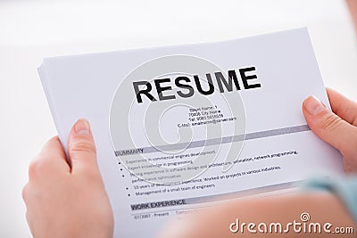 Woman holding resume Stock Photo