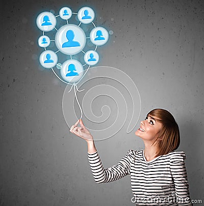 Woman holding social network balloon Stock Photo