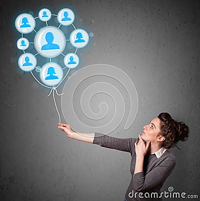 Woman holding social network balloon Stock Photo