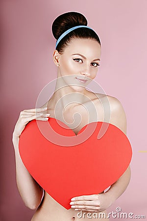 woman holds big red heart i love you in her hands Stock Photo