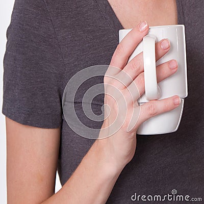 Woman Holds A Cup of Coffee Stock Photo