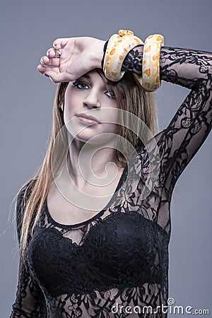 Woman holds in her hand the snake Stock Photo