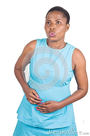 Woman suffering from excruciating belly pain Stock Photo