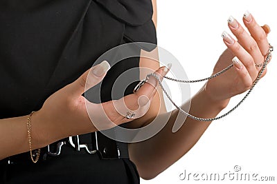 Woman holds a jeweller chain Stock Photo