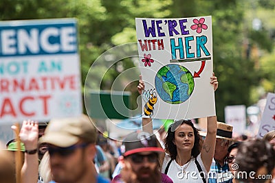 Woman Holds Up Sign Marching At Atlanta Earth Day March Editorial Stock Photo