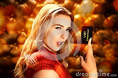 Woman holds vip member card Stock Photo