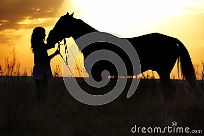 Woman and horse Stock Photo