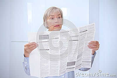 Woman huge drug package leaflet Stock Photo