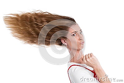 Woman with hurry-blown hair Stock Photo