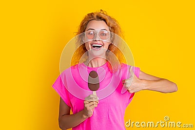 woman with icelolly ice cream in studio, thumb up. woman with icelolly ice cream Stock Photo