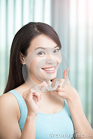 Woman with invisible braces Stock Photo