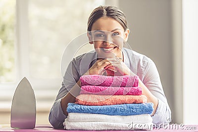 Woman ironing clothes Stock Photo